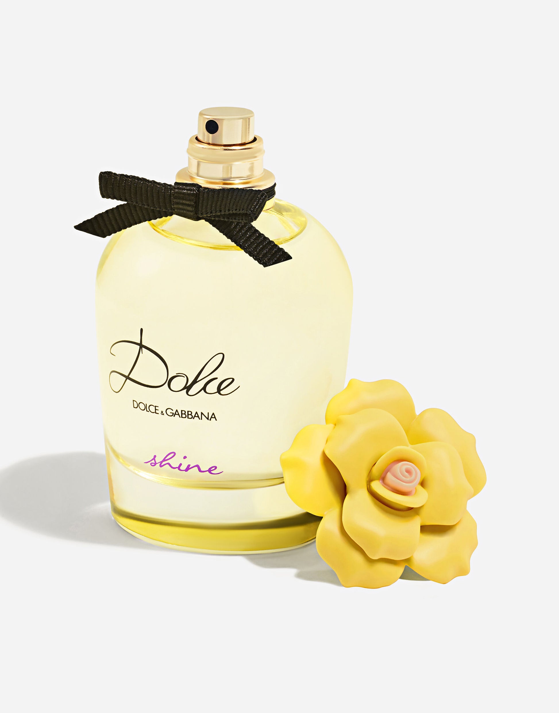 Flacon jaune Dolce Shine – Parfum joyeux et lumineux, disponible chez Parfumerie Passion au meilleur prix | Livraison rapide partout au Maroc